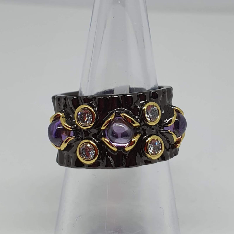 Missaji stunning rounded purple and black fashion ring