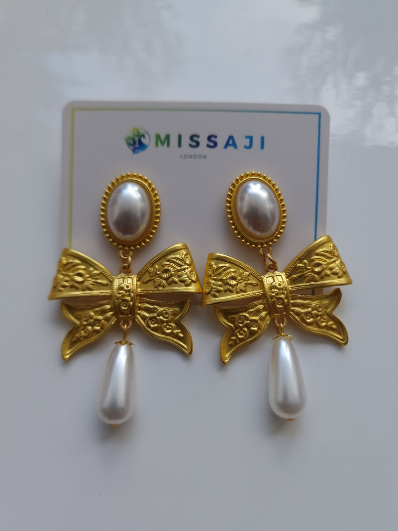 Gold bow knot earrings