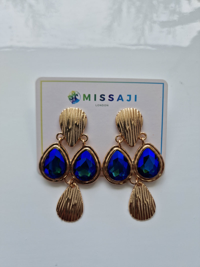 Gold and blue owl eye earrings