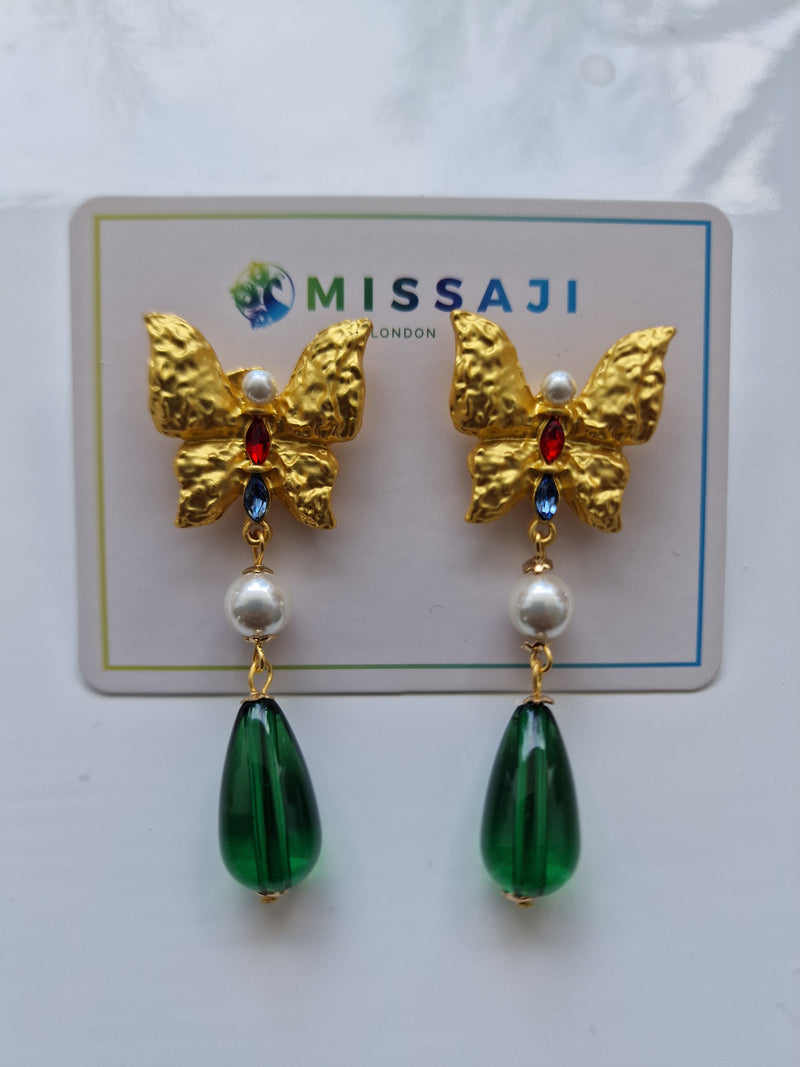 Green butterfly style drop earrings