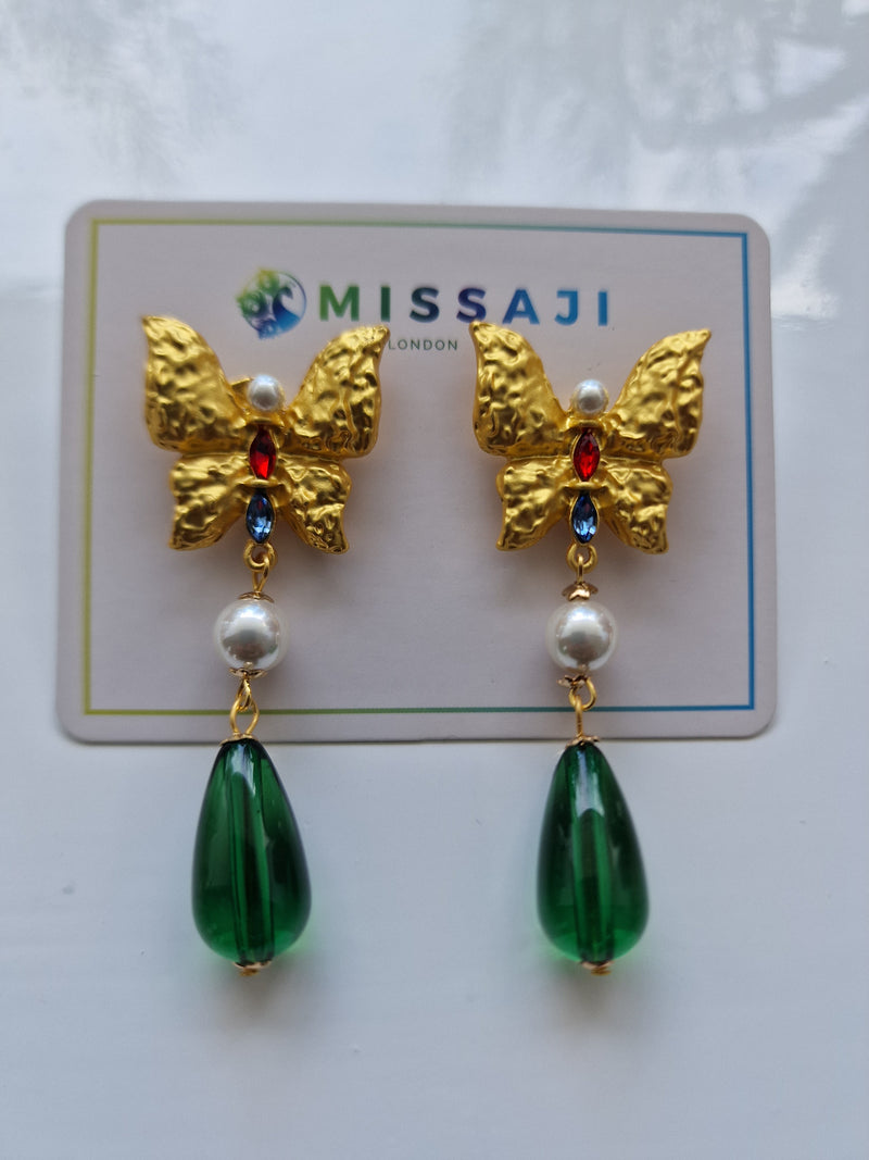 Green butterfly style drop earrings