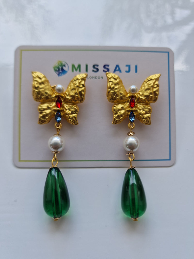 Green butterfly style drop earrings