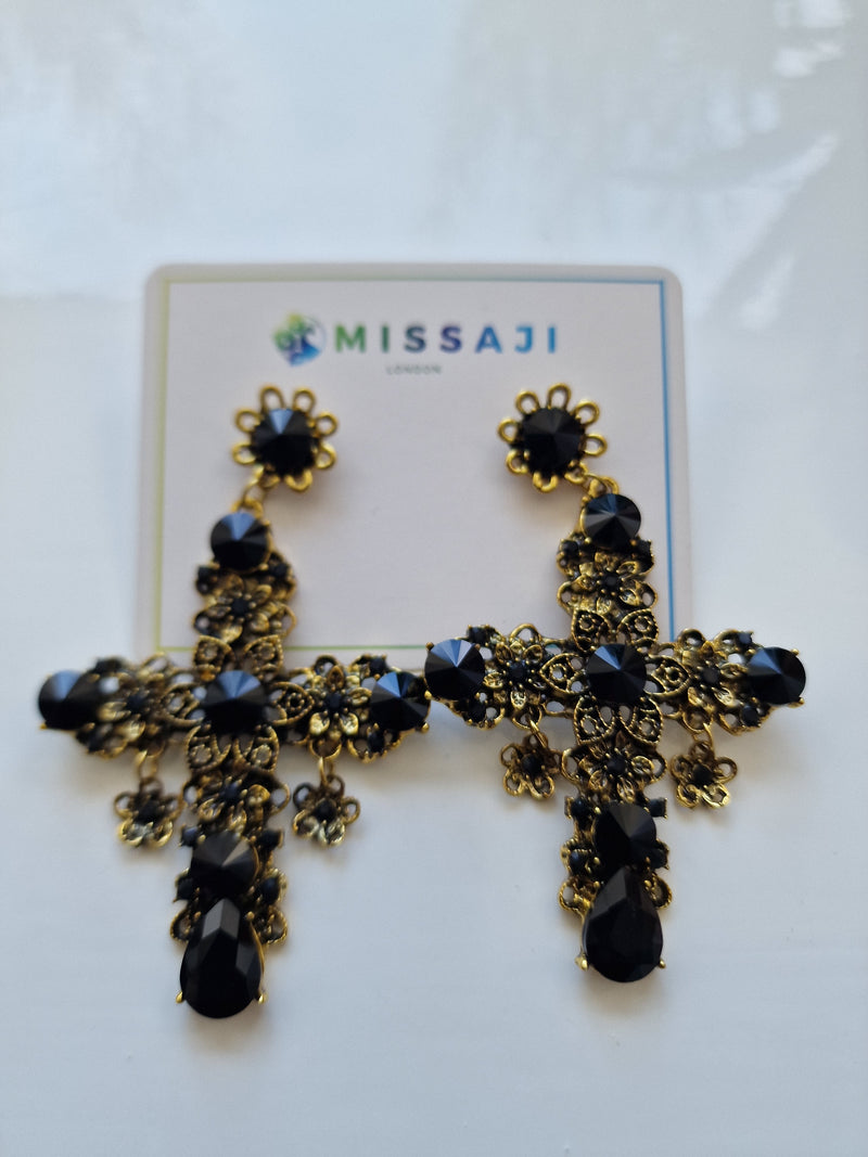 Black and gold cross earrings